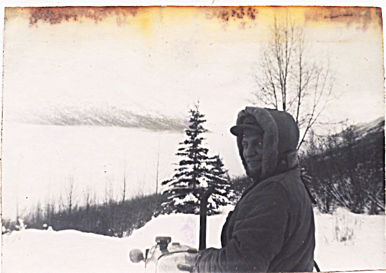 1959 - 1960 winter proving up on land -- dad on tractor -- see us above the blanket of clouds that erased the valley below us - we were often above the clouds -- or in them (fog)