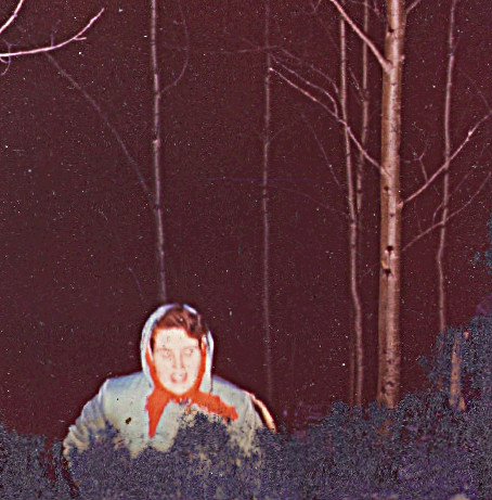 1959 Mother walking up the mountain (fire damaged photograph) - How does it feel to live one's entire life from early childhood in the darkness and not even know you are there?  Could she feel or understand that she was including her children (and her spouse) with her in that darkness -- because she was our mother we had no choice but to stick with her, to follow along with her -- through all her lost upheavals and the consequences of her troubled, troubled mind.