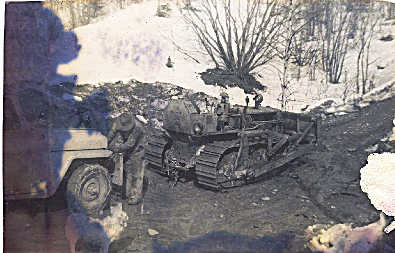 1959 Neighbor Pollard hooking chain between Jeep truck with Jamesway flooring to tractor - hauling up Horror Hill