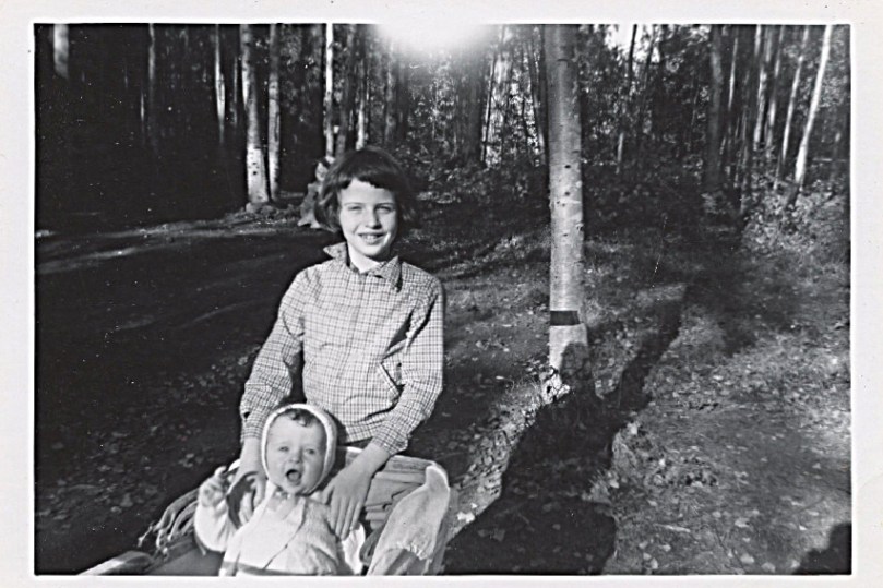 1961, I am 9 almost 10 - Here's a happy picture of me with Baby David, taken in yard at Eagle River log house, Alaska