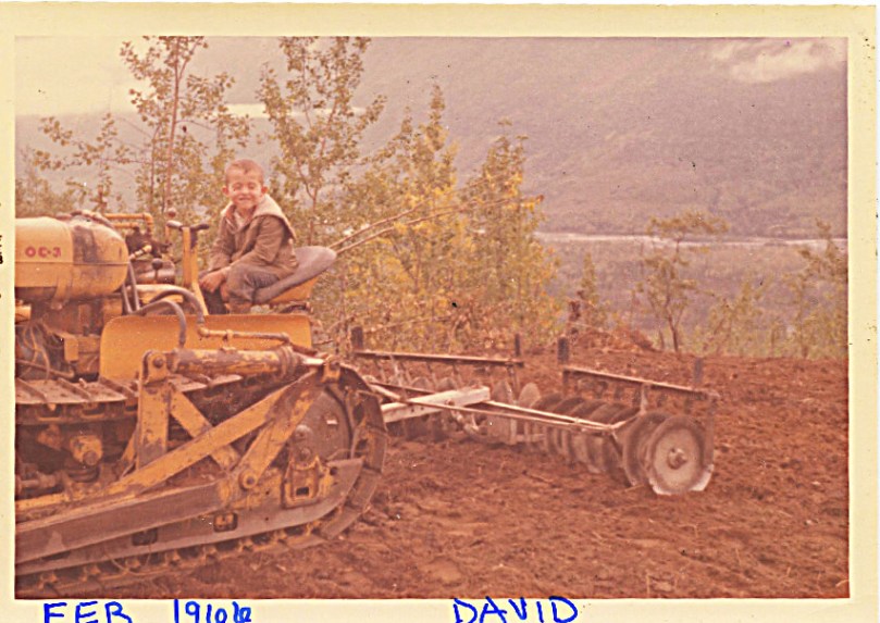 1966 clearing 2nd field dave on tractor