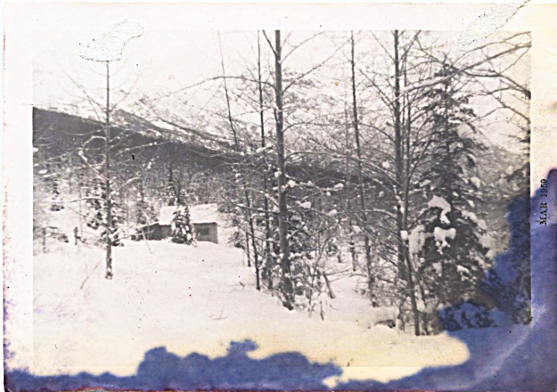 Their homestead (fire damaged photograph of my dad, our jeep, their home)