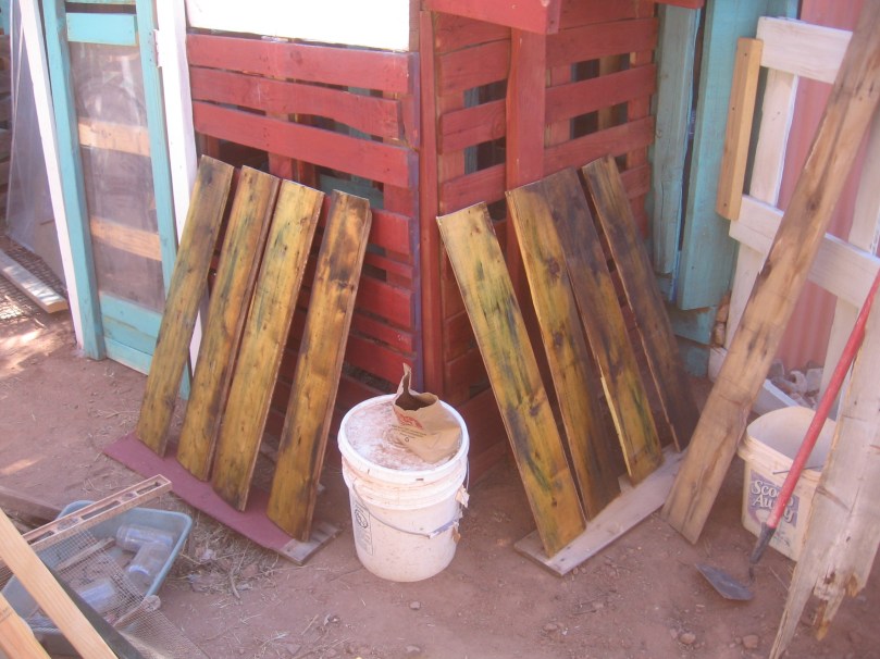Recycled very OLD siding - stained/painted/oiled with the linseed.  My hands in spite of several washings still smell of the oil - a comforting smell to me, warm and reminding of the great forests I have been blessed to see in my life - and the life of the forest that was in every new and old board I ever lay my hands on - pallets included