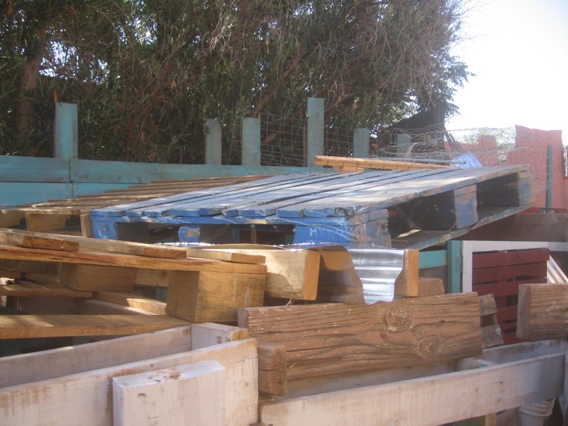 Both sides are angled to drain into the gutter at center.  This is tall enough for the goats to walk under - seemed silly to find lumber to put the whole thing way up into the air!